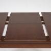 53437